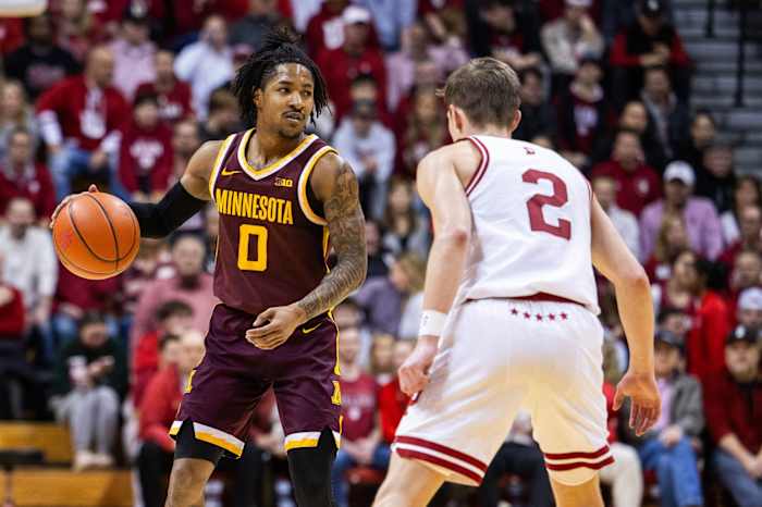 Minnesota Golden Gophers guard Elijah Hawkins (0) dribbles the ball while Indiana Hoosiers guard Gabe Cupps (2) defends in the second half at Simon Skjodt Assembly Hall.